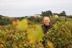 Patrick Baudouin winemaker captured in his vineyards in Anjou